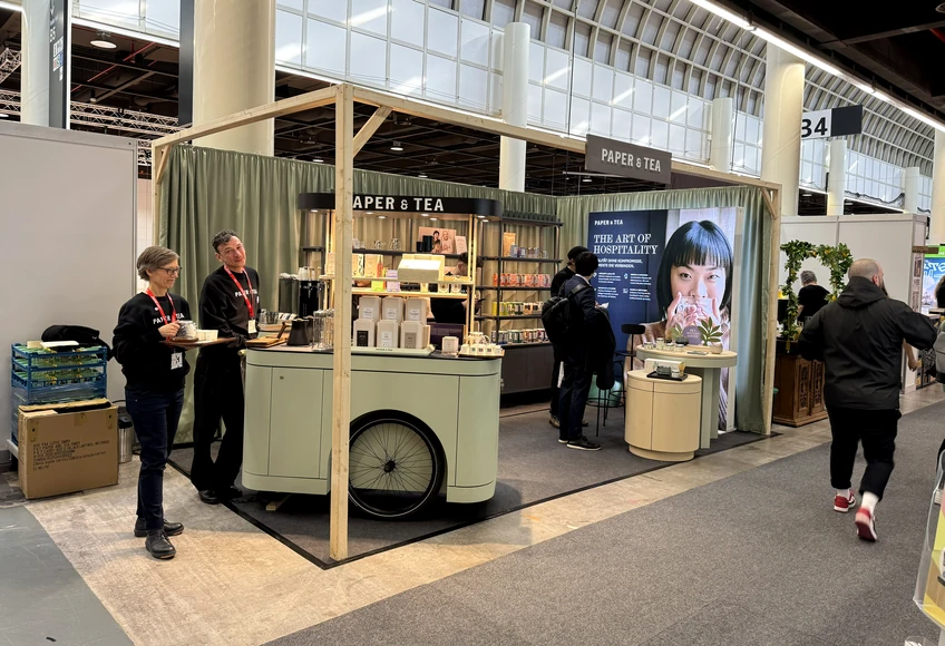 ESBAU trade show booth layout showing visitor flow, reception counter, staff interaction and meeting area
