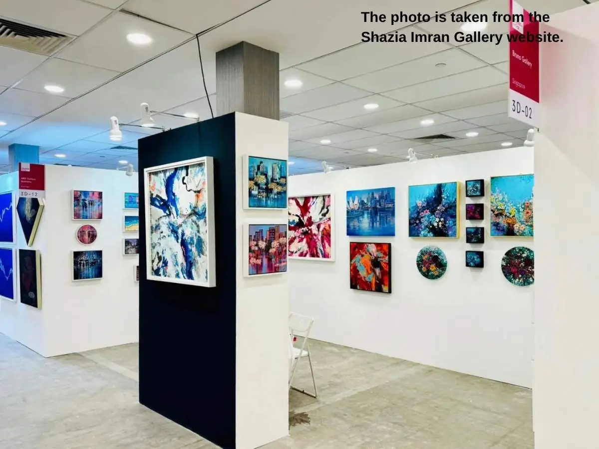 Affordable Art Fair  2026 stand in Singapore with gallery-style display and meeting corner at F1 Pit Building