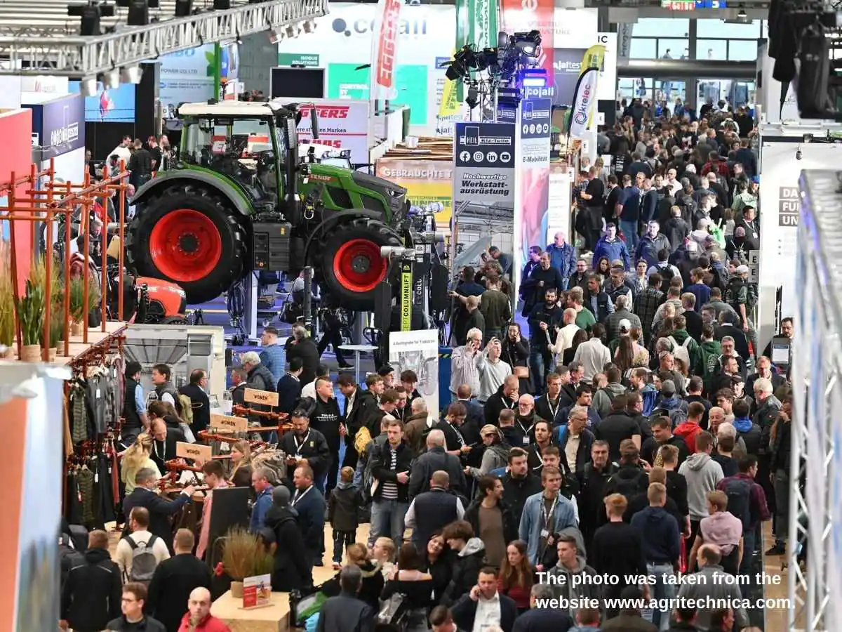 Agritechnica  2027 stand in Hanover with meeting area and machinery display at Hannover Messe