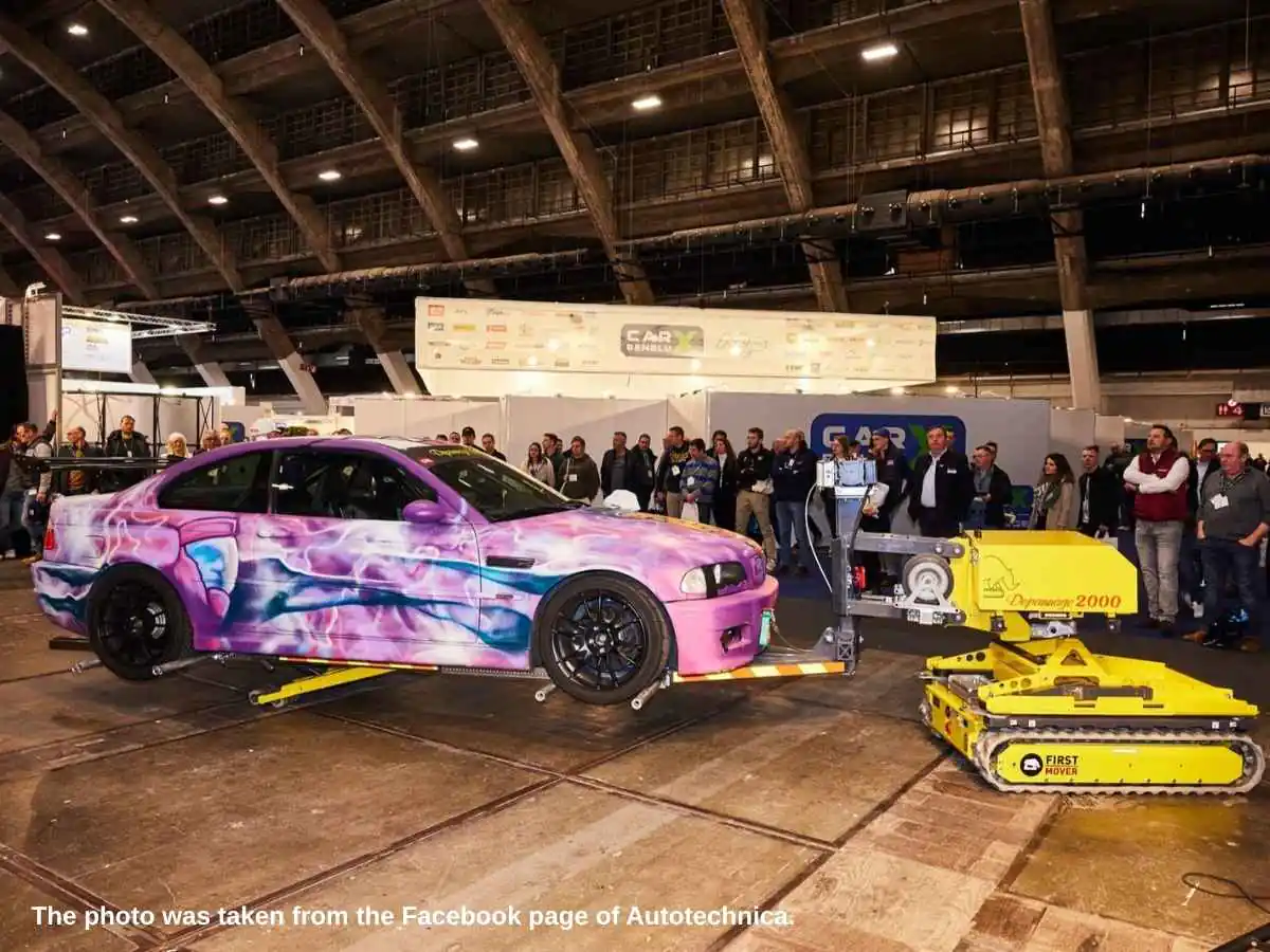 Autotechnica  2028 Brussels stand with vehicle display and dealer meeting zone at Brussels Expo