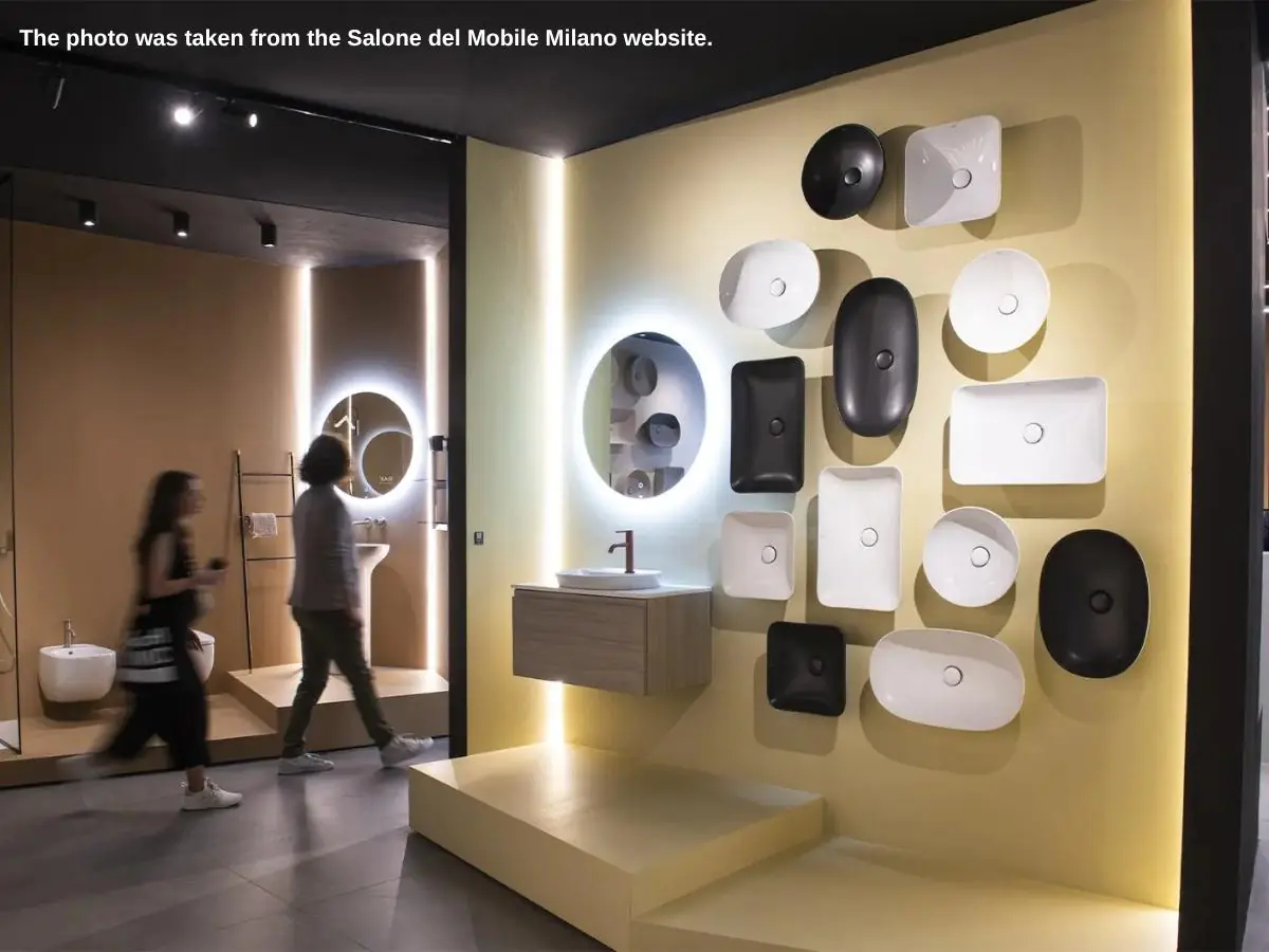 International Bathroom Exhibition  2027 stand in Milan with shower cabins and meeting area at Fiera Milano