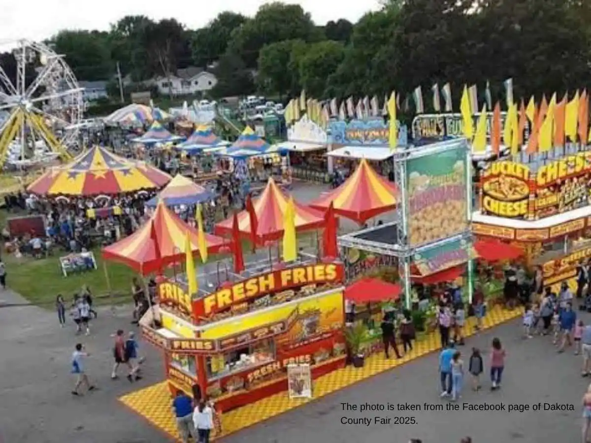 Exhibition stand at Dakota County Fair  2026 in Farmington with live music display and meeting area