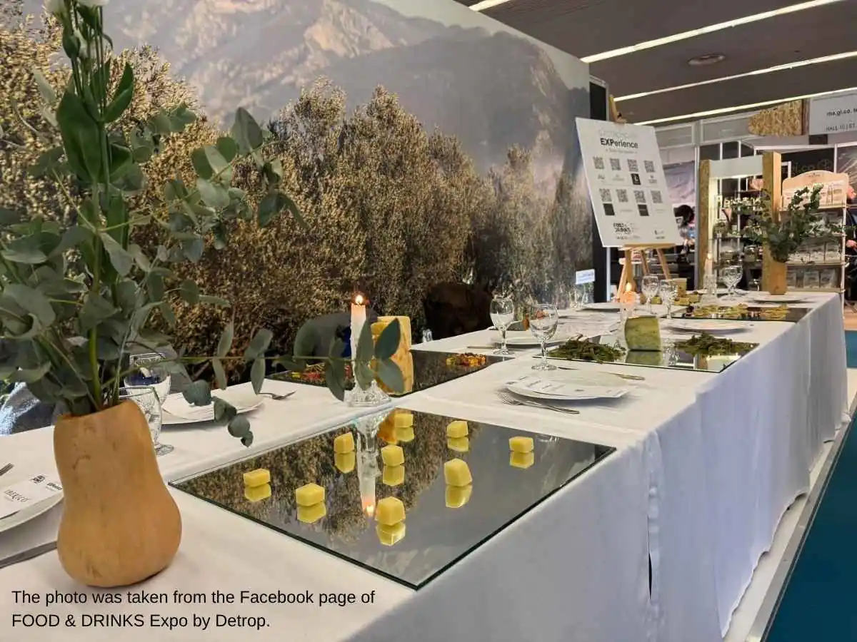 Food & Drinks by Detrop  2026 stand in Thessaloniki with tasting counters and meeting area at Thessaloniki International Exhibition Centre