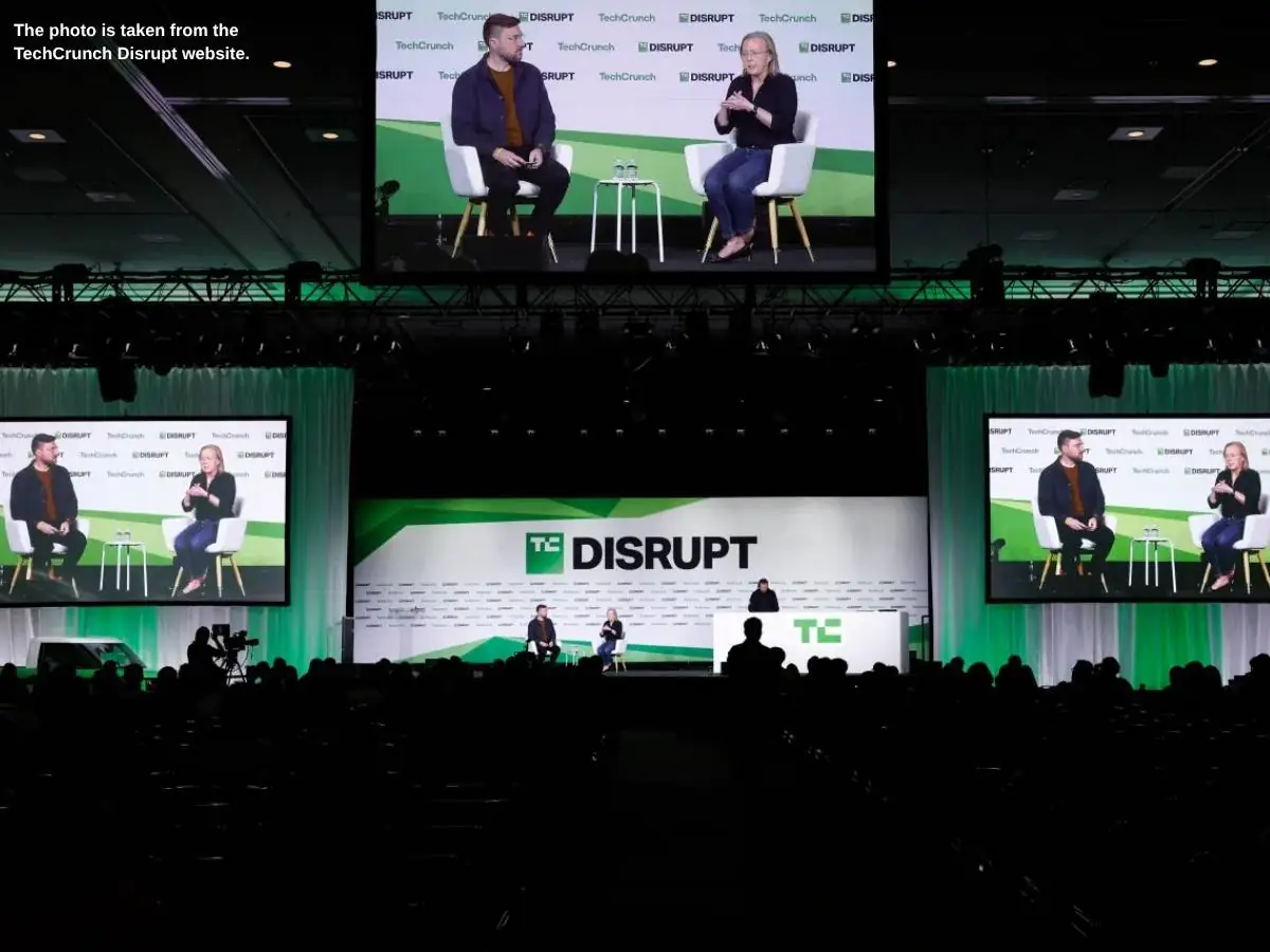 Disrupt  2026 stand in San Francisco at Moscone Center with demo stations and meeting pods