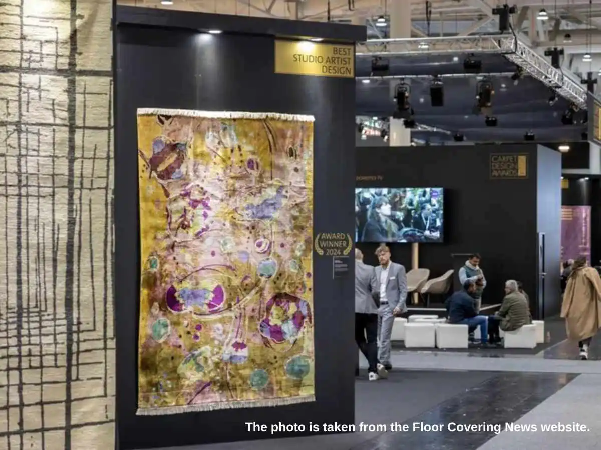 Domotex  2028 stand in Hanover with carpet sample wall and meeting area at Hannover Messe