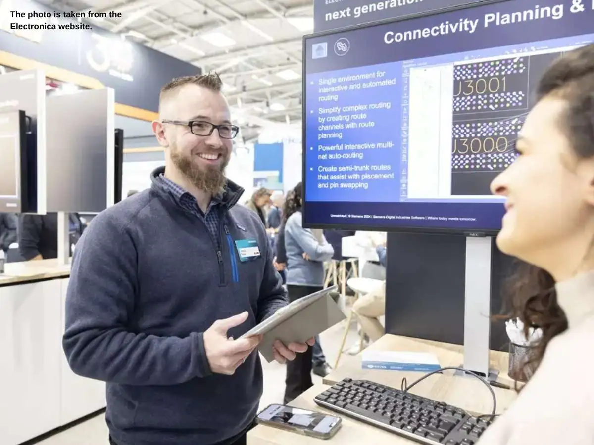 electronica  2026 stand in Munich with demo stations and meeting area at Messe München