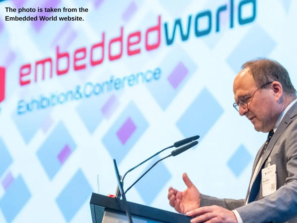 Embedded World  2027 stand in Nuremberg with demo stations and meeting area at NürnbergMesse
