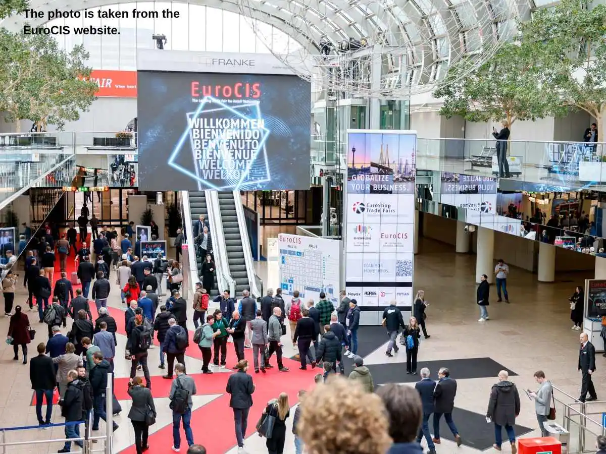 EuroCIS  2027 stand in Dusseldorf with retail tech demo stations and meeting area at Messe Düsseldorf
