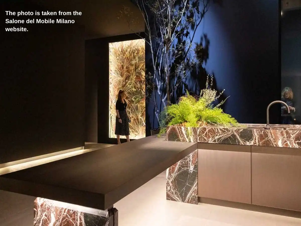 EuroCucina FTK  2027 stand in Milan with kitchen demo counter and meeting area at Fiera Milano