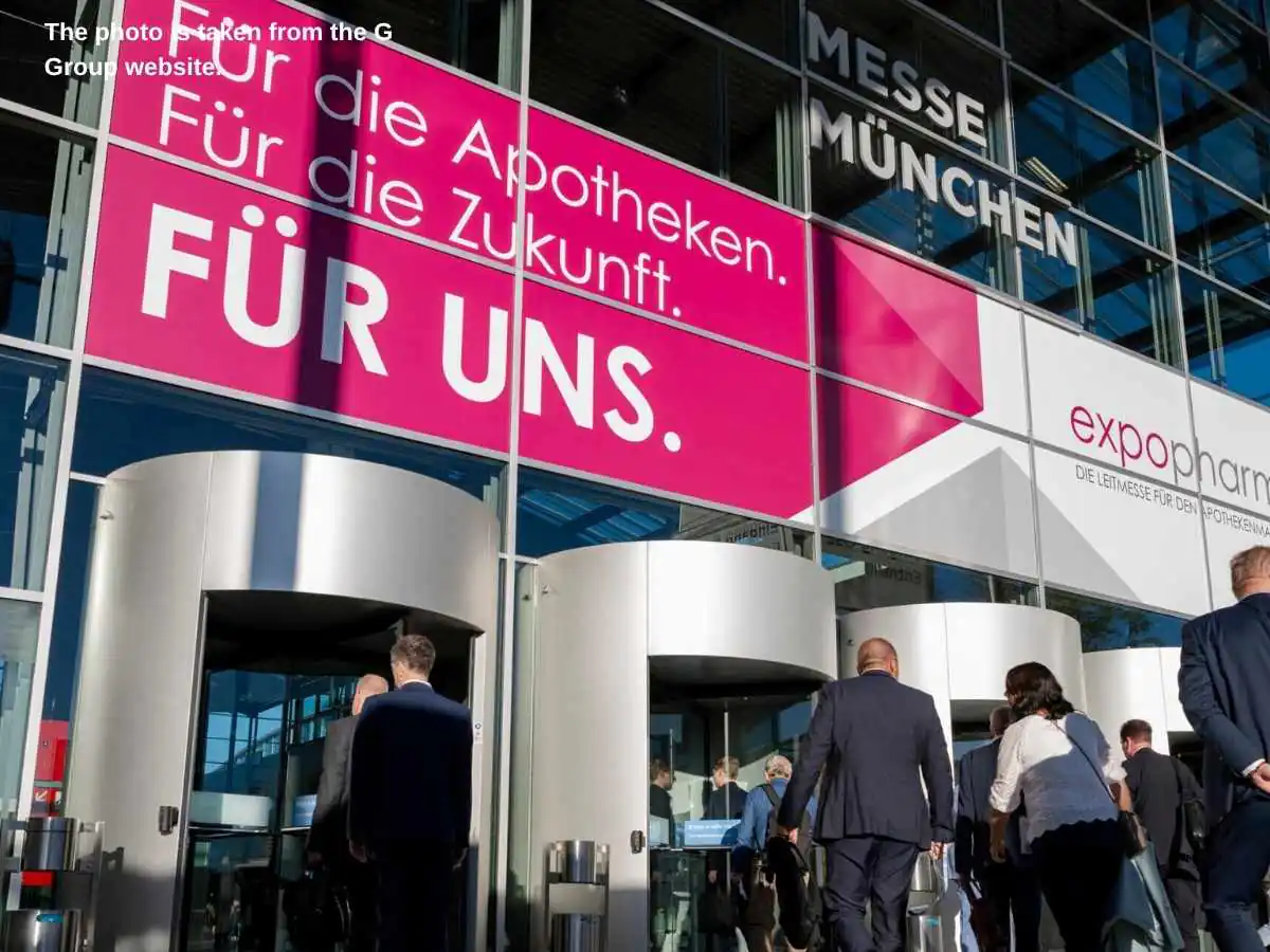Expopharm  2026 stand in Munich with consultation area and pharmacy product display at Messe München
