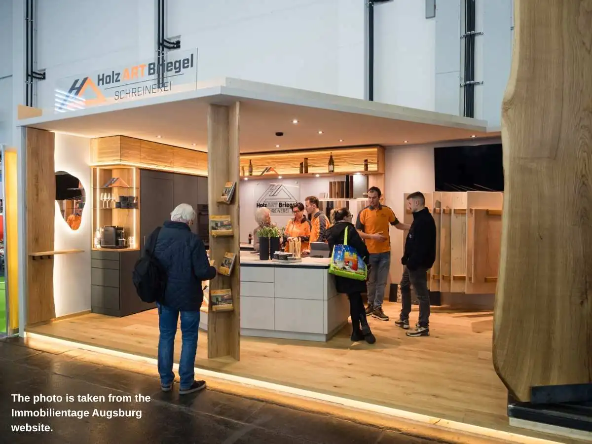 Immobilientage  2027 stand in Augsburg with meeting area and smart home demo space