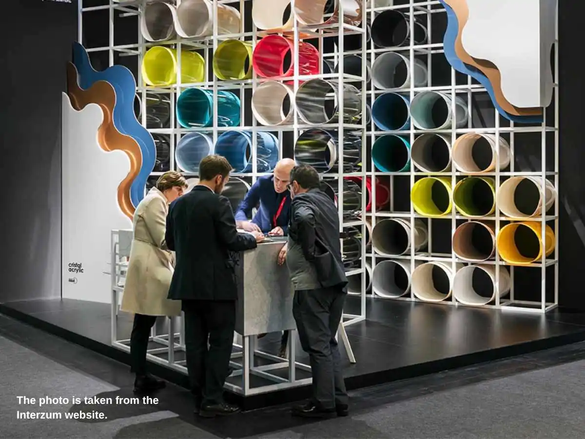 Interzum  2027 stand in Cologne with materials display and meeting zone at Koelnmesse