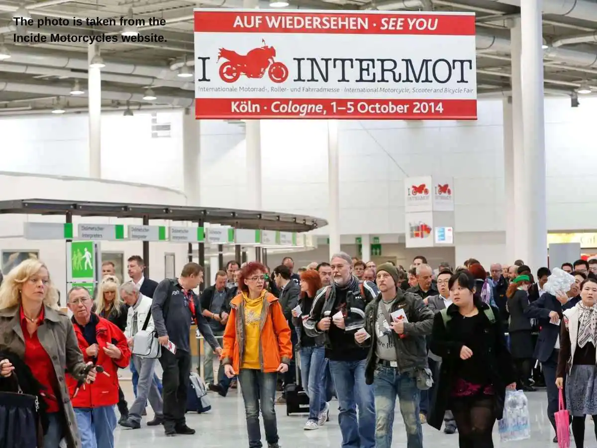INTERMOT  2027 stand in Cologne with motorcycle display and meeting area at Koelnmesse