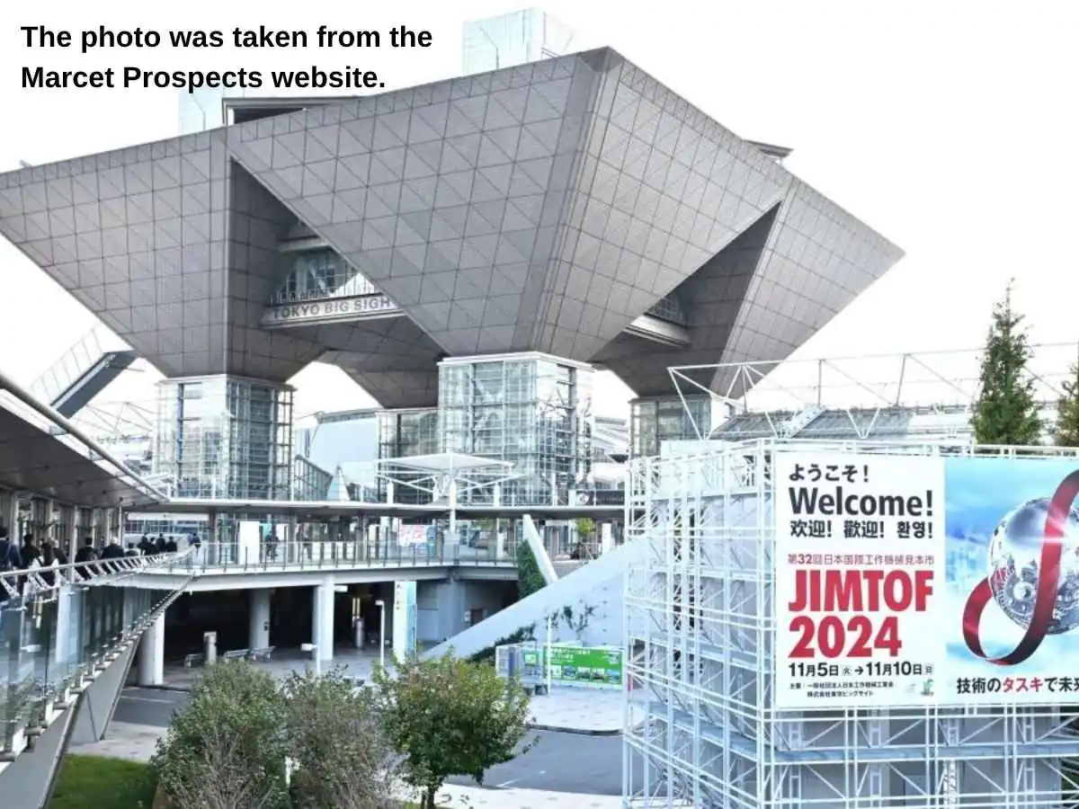 JIMTOF  2026 Tokyo stand with machine tool demo area at Tokyo Big Sight