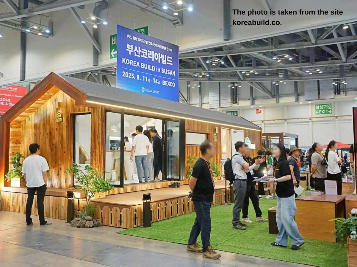 Exhibition stand at Korea Build Busan  2026 in Busan with sample wall and meeting area at BEXCO