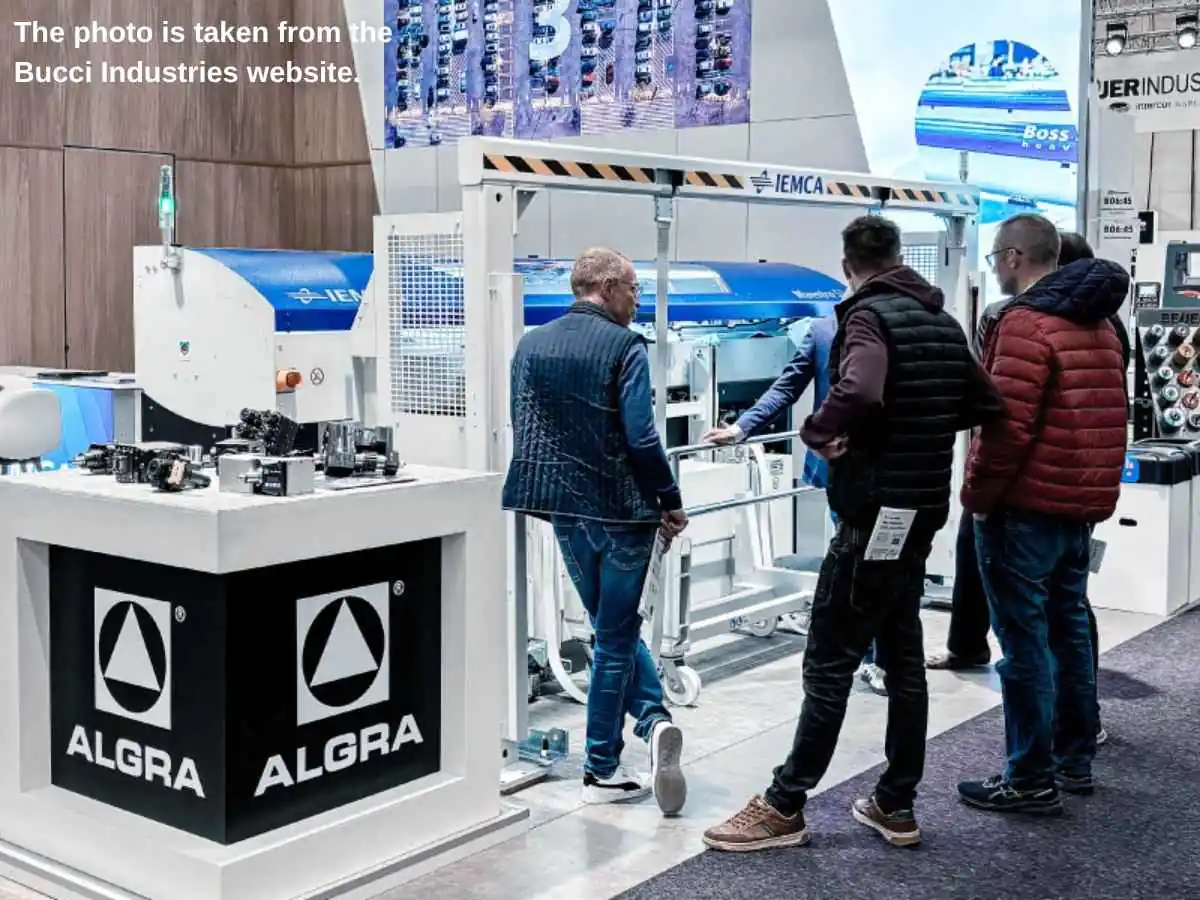 Exhibition stand at International Machine Tools Exhibition  2026 in Brno with machinery demo zone and meeting area at Brno Exhibition Centre