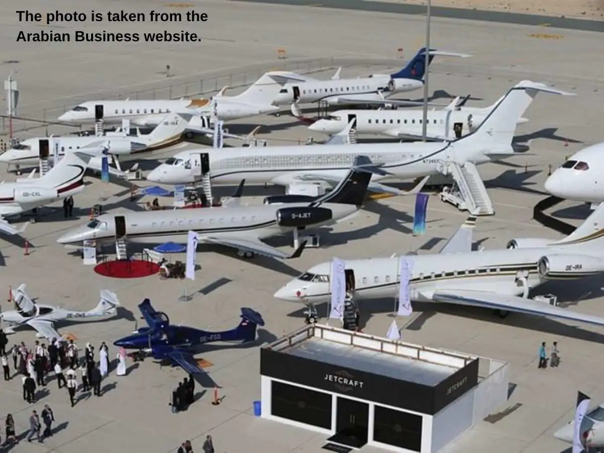 MEBAA Show  2026 stand in Dubai at Al Maktoum International Airport with meeting area and aircraft display