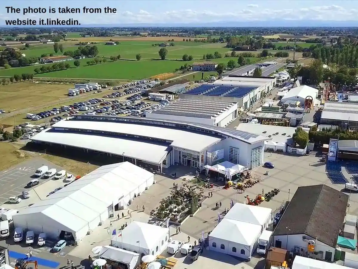 Millenary  2026 exhibition stand in Gonzaga with machinery demo area and meeting space at Millennial Fair of Gonzaga