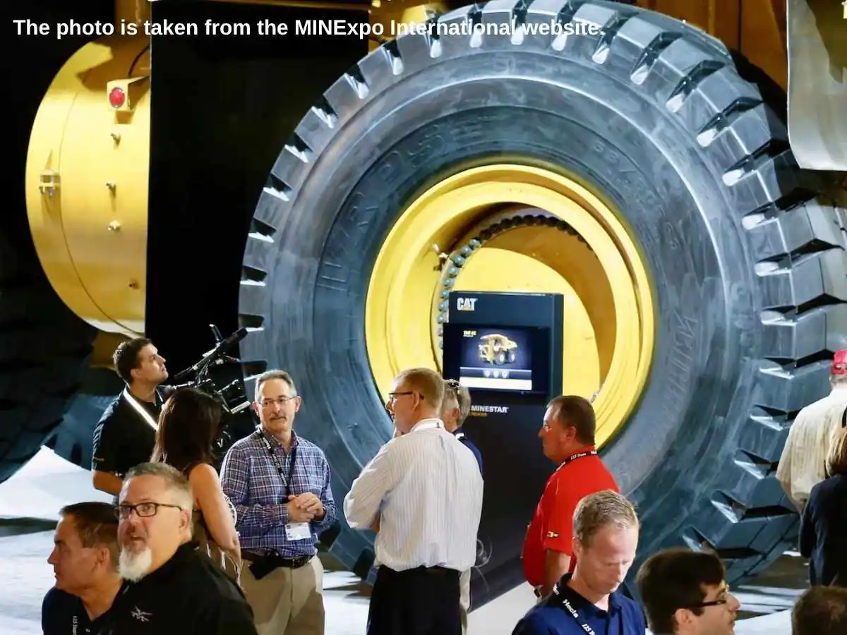 MINExpo International  2028 stand in Las Vegas with machinery display and technical meeting area