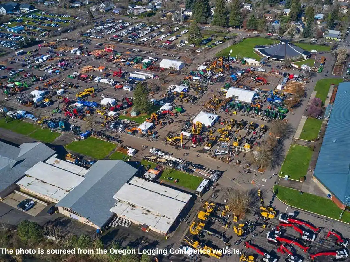 OLC  2027 exhibition stand in Eugene with forestry product display and meeting area at Lane Events Center