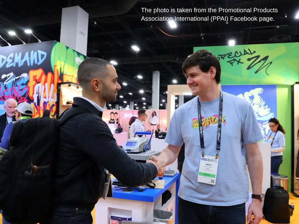 PPAI Expo  2027 booth in Las Vegas with meeting area and product display at Mandalay Bay Convention Center