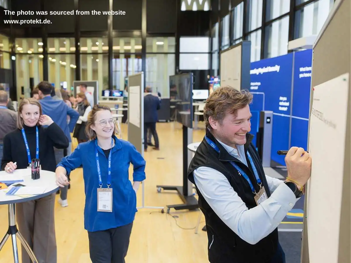Protekt  2026 exhibition stand in Leipzig with meeting zone and security-focused demo area