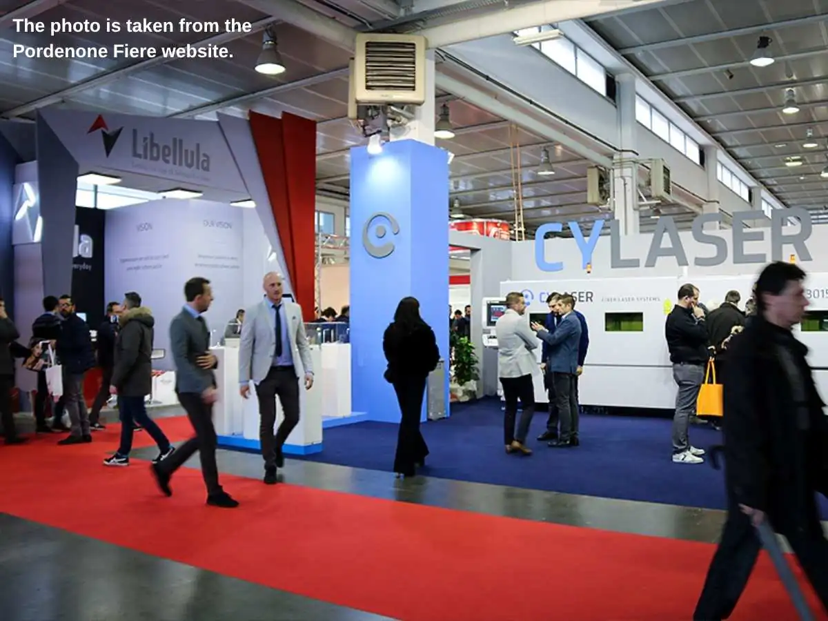 Samuplast  2028 stand in Pordenone with machinery display and meeting area at Pordenone Fiere