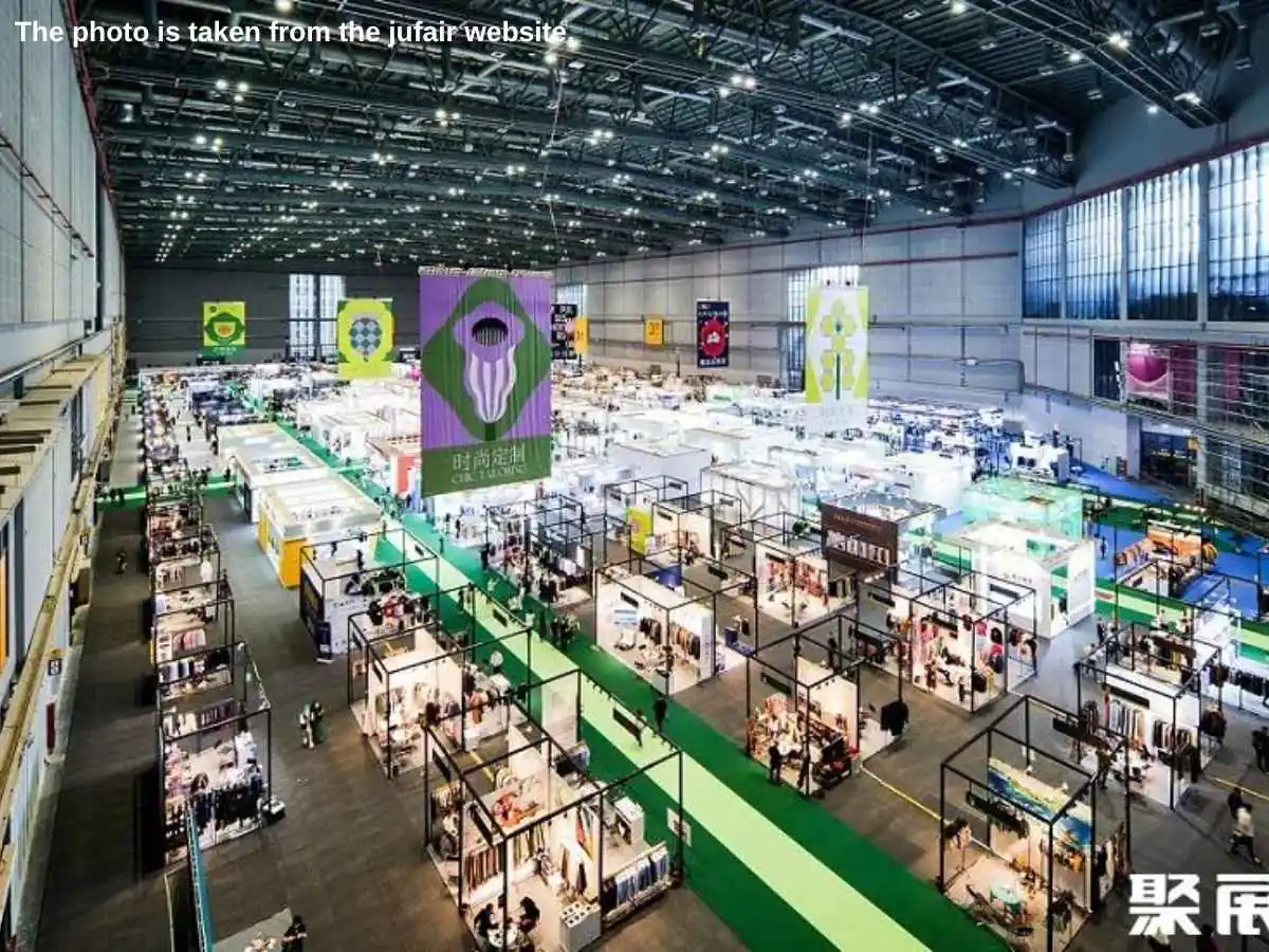 China International Fashion Fair  2026 stand in Shanghai with meeting zone and fashion display at NECC