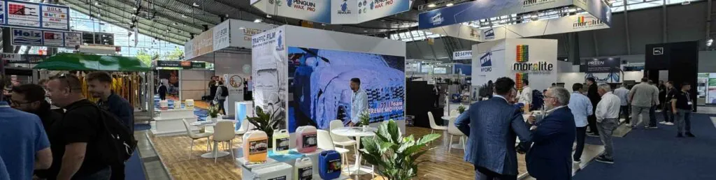 Trade show booth size comparison in a busy exhibition hall