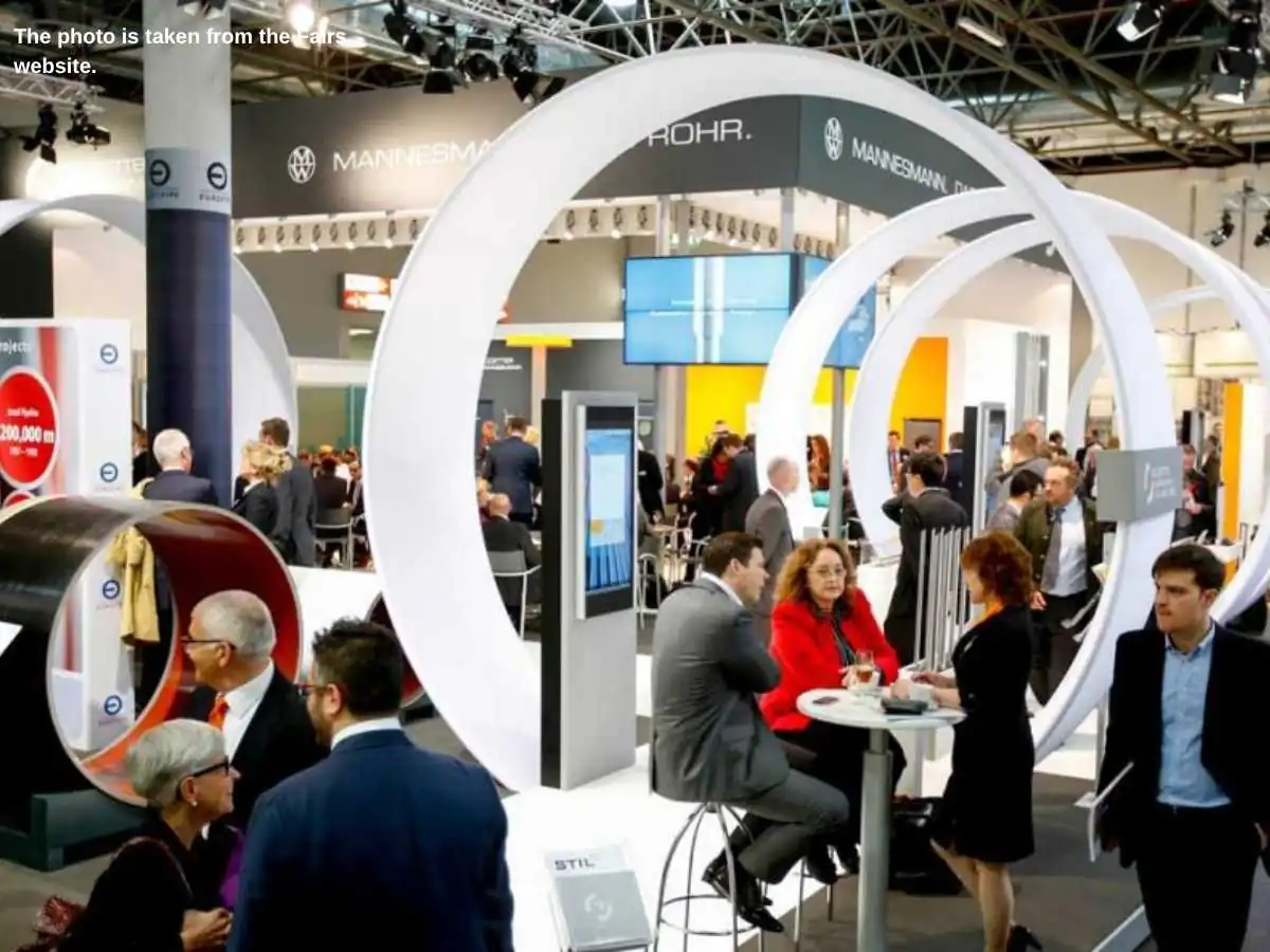 Tube Dusseldorf  2028 stand in Dusseldorf with pipe sample wall and meeting area at Messe Düsseldorf