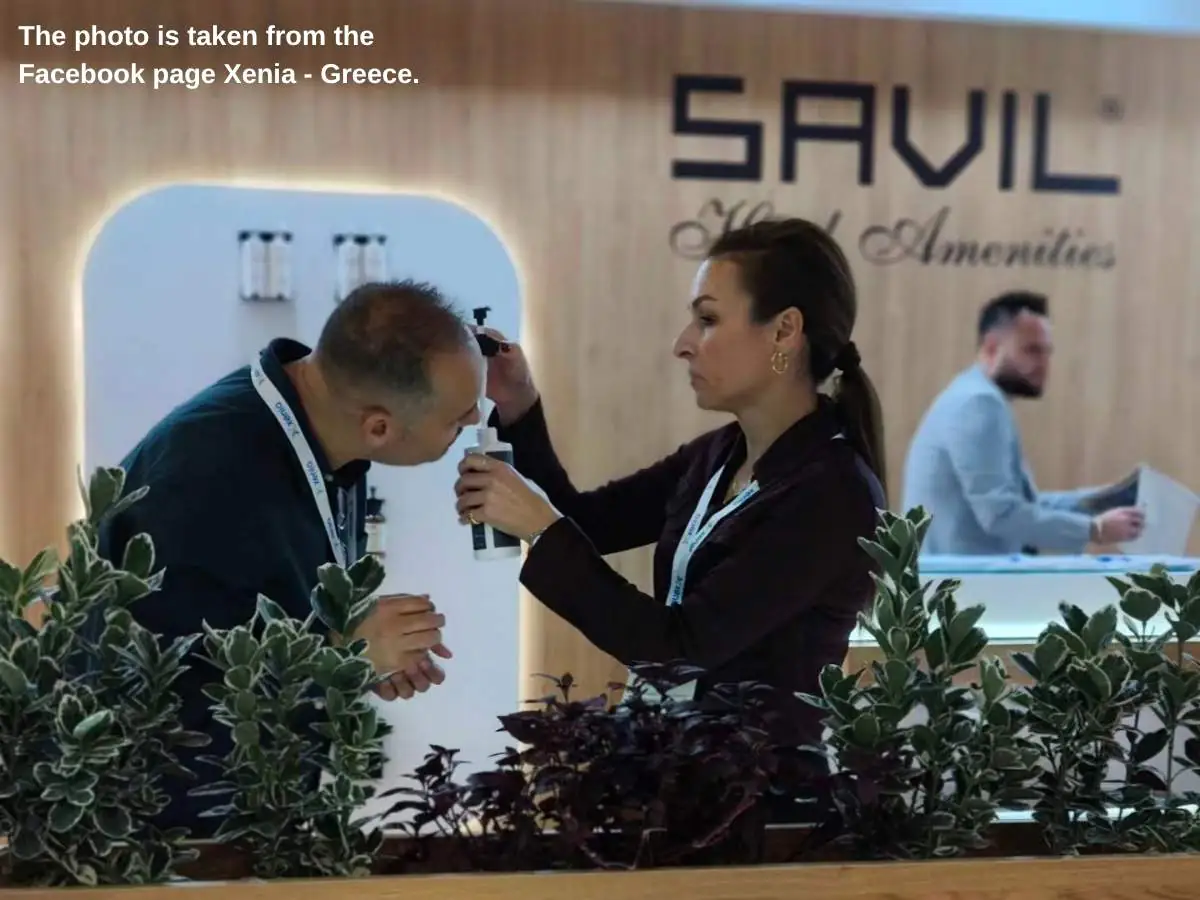 Xenia  2026 Athens stand with hospitality demo counters and meeting area